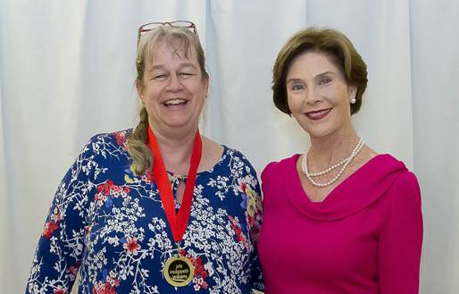 Author Julie Williams (A Rare Titanic Family) and former First Lady Laura Bush, winners of the Ella Dickey Literacy Award at the 2014 Cherry Blossom Festival in Marshfield, Mo.